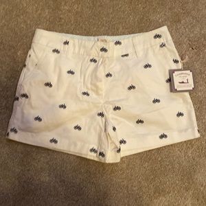 White Shorts with blue bicycles on them